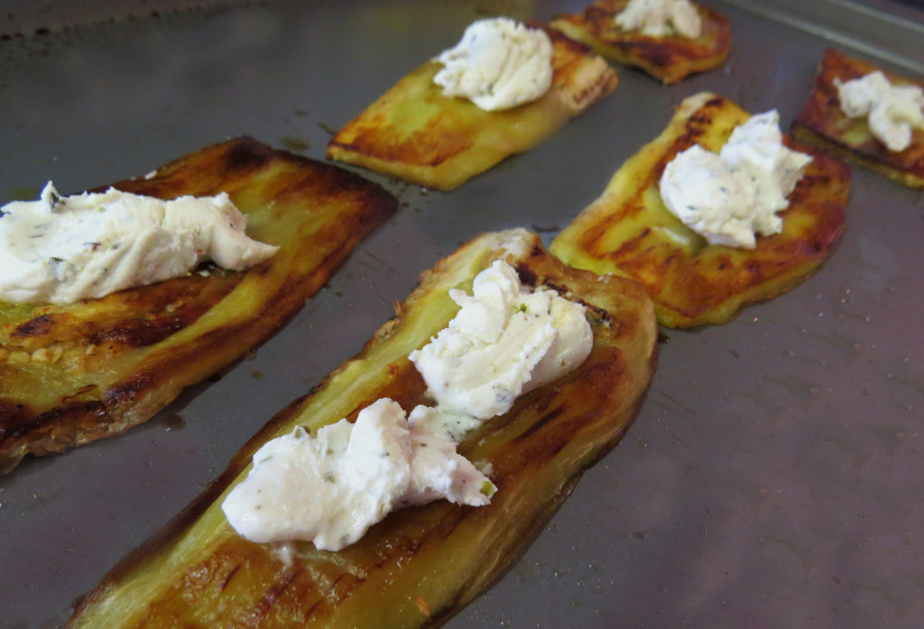 The baked eggplant topped with goat cheese.